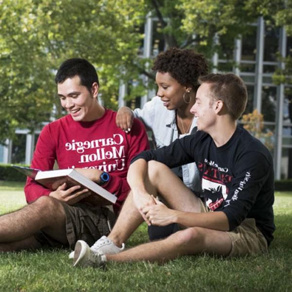 Students on lawn wearing CMU shirts